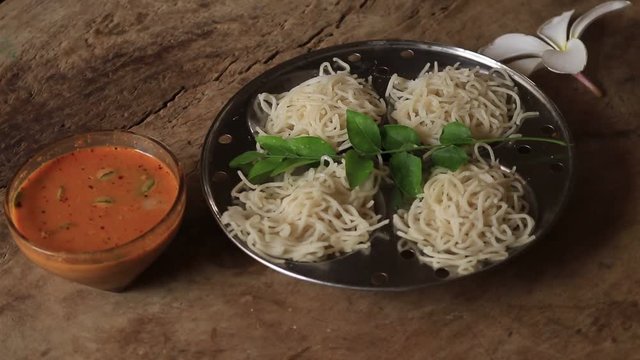 Idiyappam rice noodle Indian food  on wood background