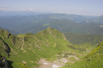 Fototapeta premium Trekking in the Carpathians, Hike to the border between Ukraine and Romania from Pop Ivan Marmarassky to Pop Ivan Chernogorsky.
