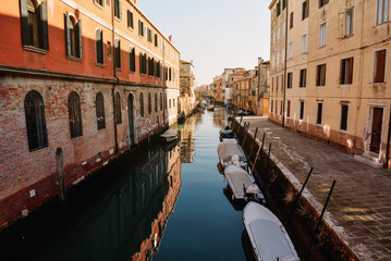 Canal with gondolas in Venice, Italy.