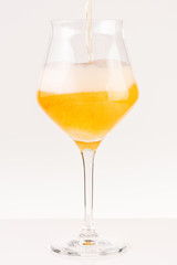 Glass of beer on white background