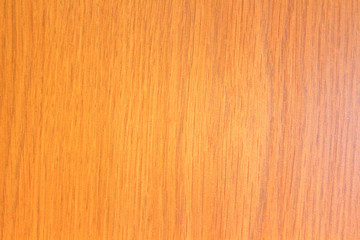 Wood texture background. Warm yellow reddish tint of wood to create a cozy mood