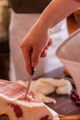 Iberian ham cut with knife
