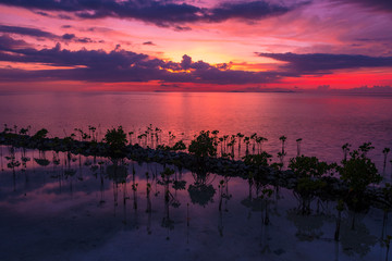 A beautiful sunset over the water at Raja Ampat