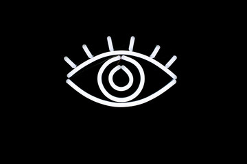 Glowing neon eye on isolated black background. Neon concept. Modern style. Neon sign.