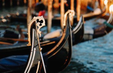 Canal with gondolas in Venice, Italy. Close-up. © alekosa