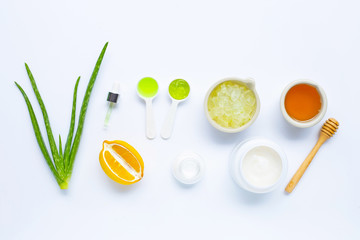 Natural ingredients for homemade skin care on white