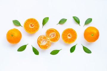 Fresh orange citrus fruit with leaves isolated on white.