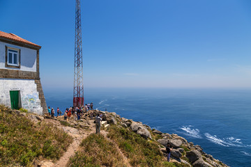 Cape Fisterre (Finisterra), Spain. Tourists on the westernmost point of Spain