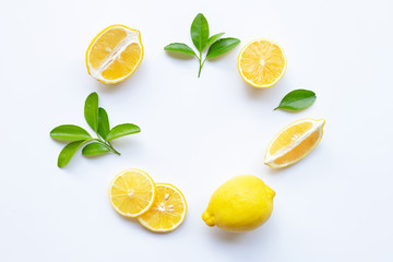 lemon and slices with leaves isolated on white. - obrazy, fototapety, plakaty