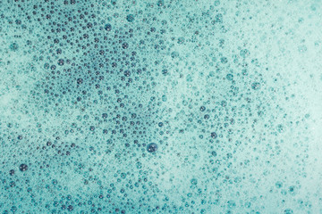 Soap bubbles background- suds liquid
