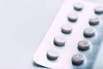 Pills in blister packs isolated on white background
