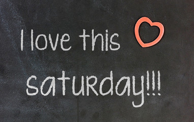 Blackboard with small red heart - I Love this saturday
