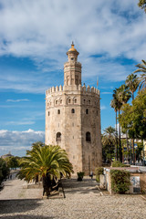 Fototapeta na wymiar The Torre del Oro (Tower of Gold) is a dodecagonal military watchtower in Sevilla, Spain. It was erected by the Almohad Caliphate in order to control access to Seville via the Guadalquivir river.