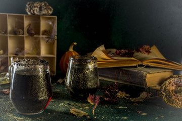 Halloween party drink idea, Witches Brew Black Sangria on Halloween styled table