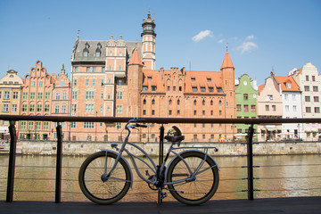 retro bicycle stand near river in old gdansk city	