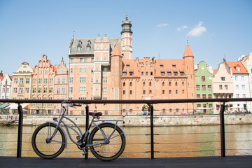 Obraz na płótnie Canvas retro bicycle stand near river in old gdansk city 