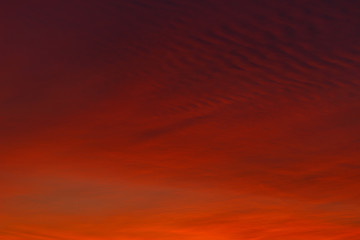 Beautiful colorful winter sunset sky. Unusual weather phenomenon. Background