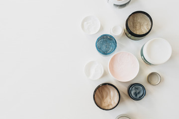 Healthcare, spa, beauty collage with cream assortment on white background. Flat lay, top view skin care concept.