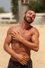 Beach, Abs , Guy. Man. Model. Shower, wash Male. Beach, Resort. Summer, Sexy, sexually, resort....