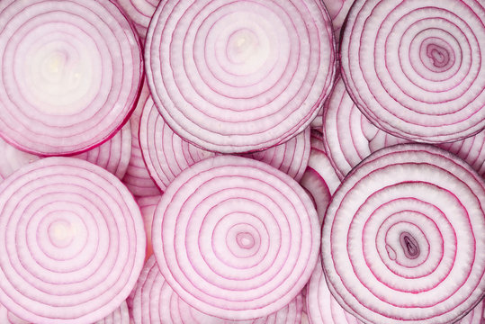 Onion slices as a background. Top view.