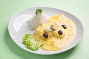 Ají de gallina a traditional peruvian food  recipe with chicken meat and pepper sauce.