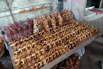 Display of traditional shoes at the street market in Kolkata, India