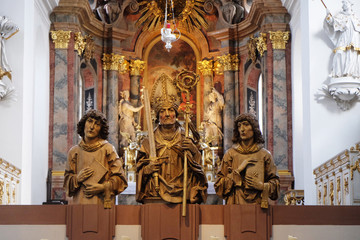 Statues of thre Martyrs Kilian, Colman and Totnan, Neumunster Collegiate Church in Wurzburg, Germany