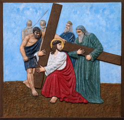 Naklejka premium 5th Stations of the Cross, Simon of Cyrene carries the cross, church of Immaculate Conception of the Virgin Mary in Malesnica, Zagreb, Croatia