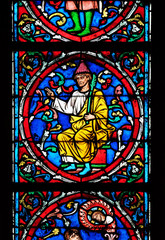 Fototapeta na wymiar Colorful stained glass window in the Notre Dame Cathedral, UNESCO World Heritage Site in Paris, France 