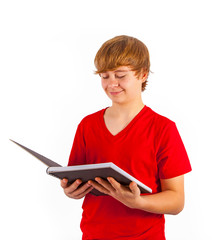 smart boy reading in a book