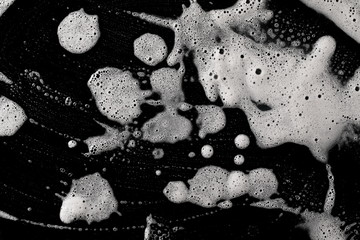 Soap foam isolated on black, with clipping path, texture and background, top view © dule964