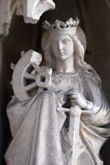 Obraz premium Saint Catherine of Alexandria on the portal of Parish Church of the Holy Blood in Graz, Styria, Austria