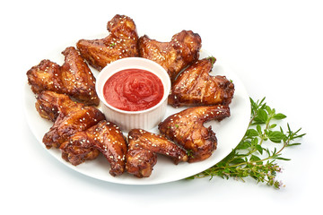 Grilled chicken wings with tomato sauce, Chinese food, close-up, isolated on white background