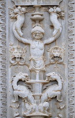 Relief on the portal of the Cathedral of Saint Lawrence in Lugano, Switzerland
