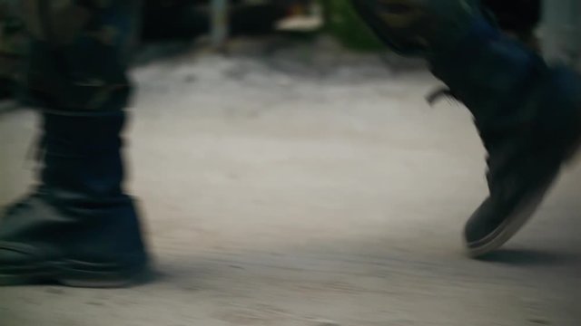 Rabel patrols the industrial zone during urban battles