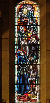 St Vincent de Paul and Louise of Marillac, stained glass window in Basilica of the Sacre Coeur, dedicated to the Sacred Heart of Jesus in Paris