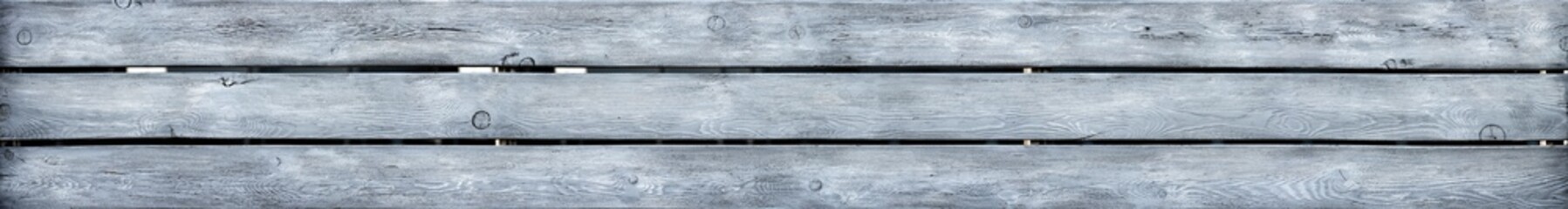 Bleached wood planks of fence texture