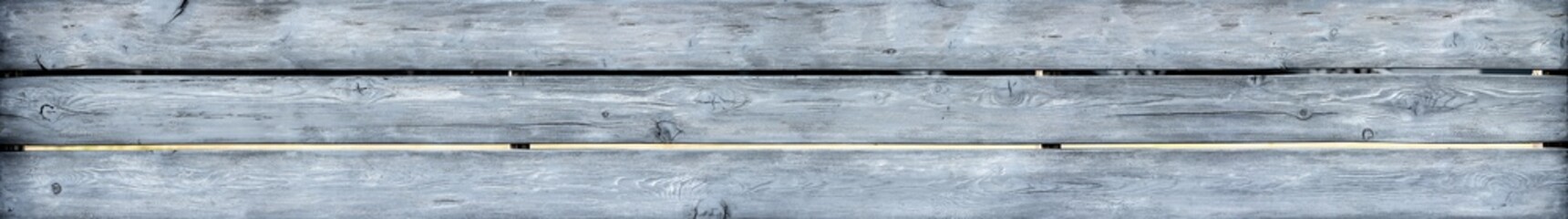 Bleached wood planks of fence texture