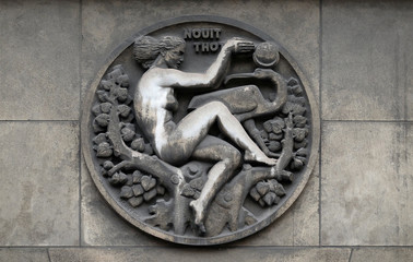 Nut and Thoth. Stone relief at the building of the Faculte de Medicine Paris, France 
