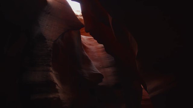 Beautiful abstract red rock formations in Antelope Canyon, Arizona. 4K UHD RAW edited footage