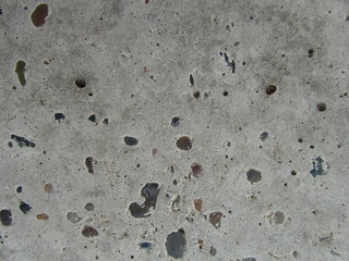 Concrete floor with small stones 