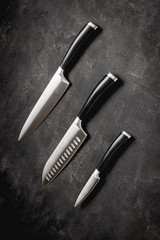 Modern Kitchen Knives Set on Stone Background. Chef's Knives Concept. - 277872284