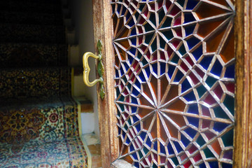  The ancient handle on the stained glass door	
