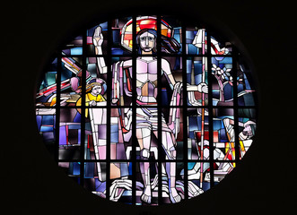 Saint Lawrence of Rome stained glass window in the Saint Lawrence church in Kleinostheim, Germany 
