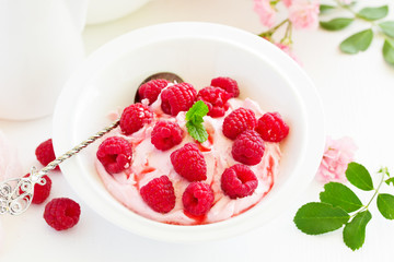 Creamy curd mousse with raspberries. Healthy breakfast.