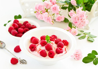 Creamy curd mousse with raspberries. Healthy breakfast.