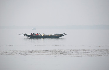Misty morning on the holiest of rivers in India. Ganges delta in Sundarbans, West Bengal, India.