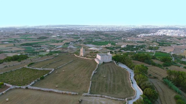 Counterclockwise aerial view of the Palace of Verdala and the Buskette fields a popular wedding venue in Malta.