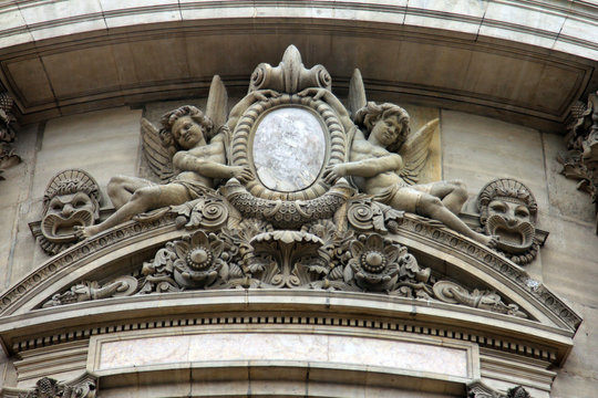 Architectural details of Opera National de Paris: Front Facade. Grand Opera (Garnier Palace) is famous neo-baroque building in Paris, France - UNESCO World Heritage Site.