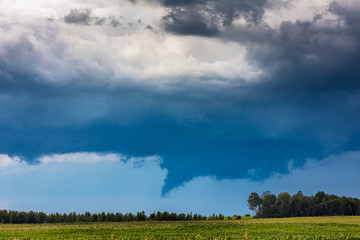 Fototapeta na wymiar Tornadic supercell storm in the fields, Lithuania, Europe